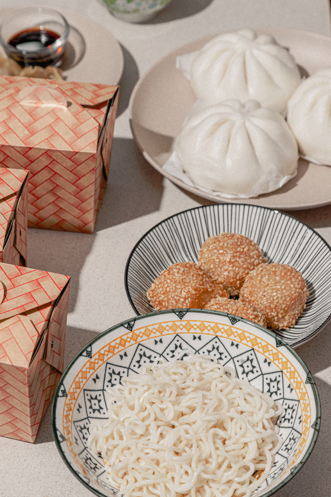 Composition of Chinese Takeout Food in Bowls and Paper Boxes