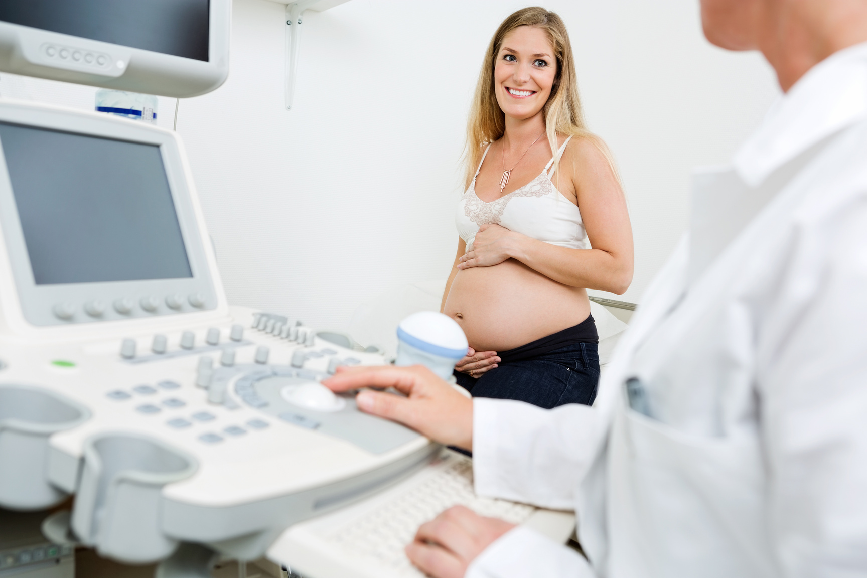 Pregnant Woman Looking at Obstetrician