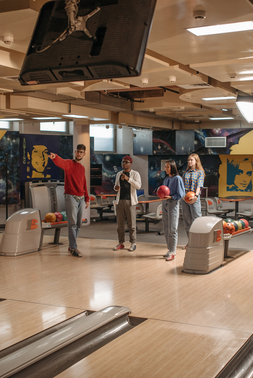 Friends Playing Bowling for Recreation