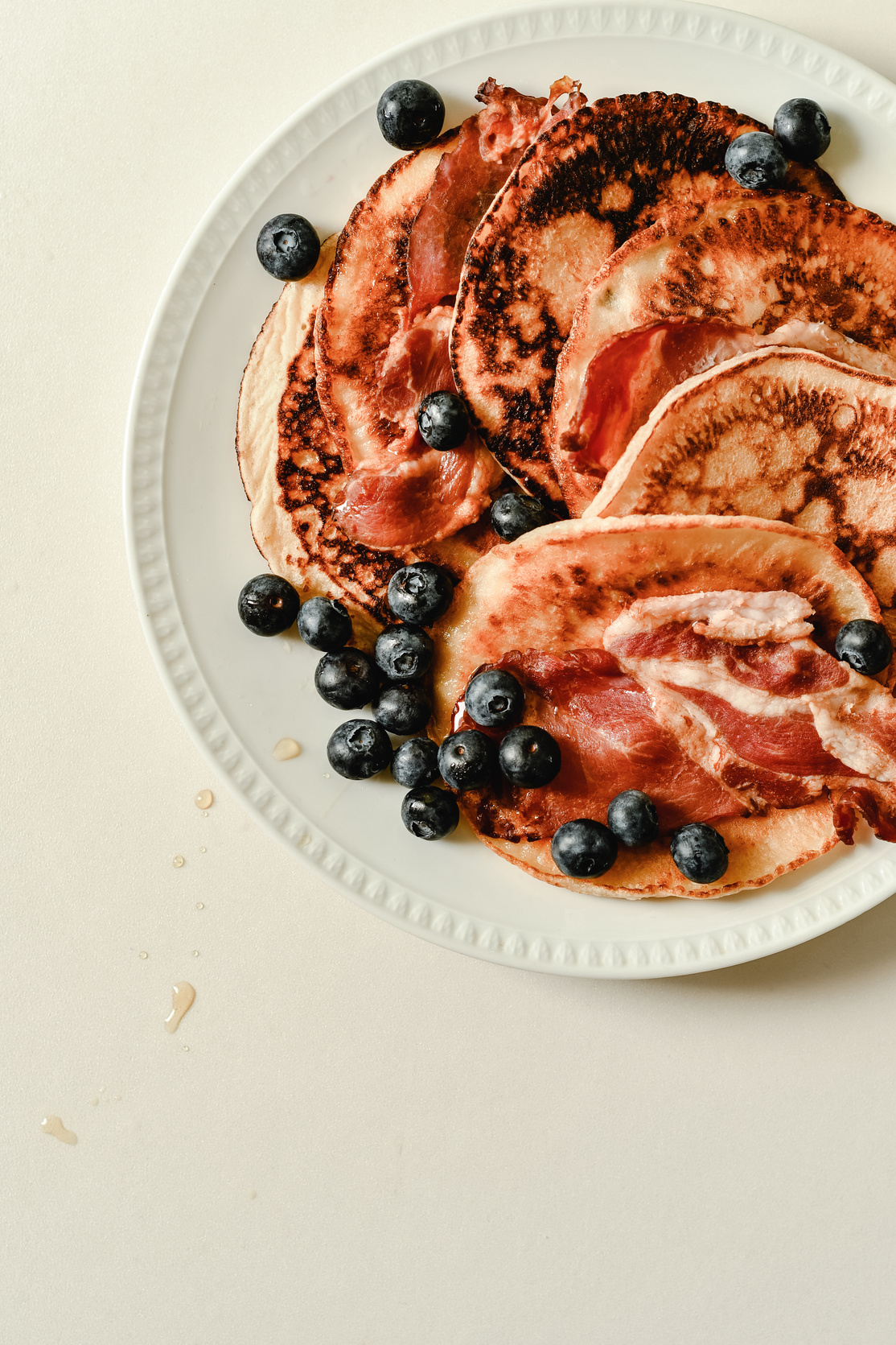 Close-Up Shot of Pancakes with Berries on a Plate